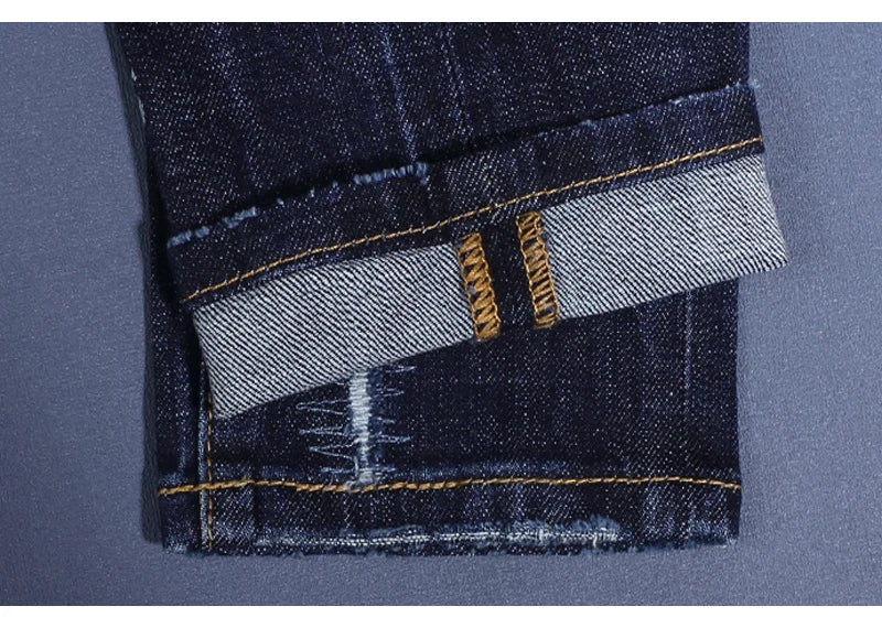 Fashionable men's deep blue jeans with scratches, washed water, nostalgic stretch, slim fit, painted jeans, designer high street
