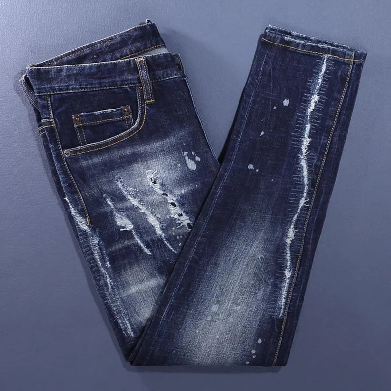 Fashionable men's deep blue jeans with scratches, washed water, nostalgic stretch, slim fit, painted jeans, designer high street